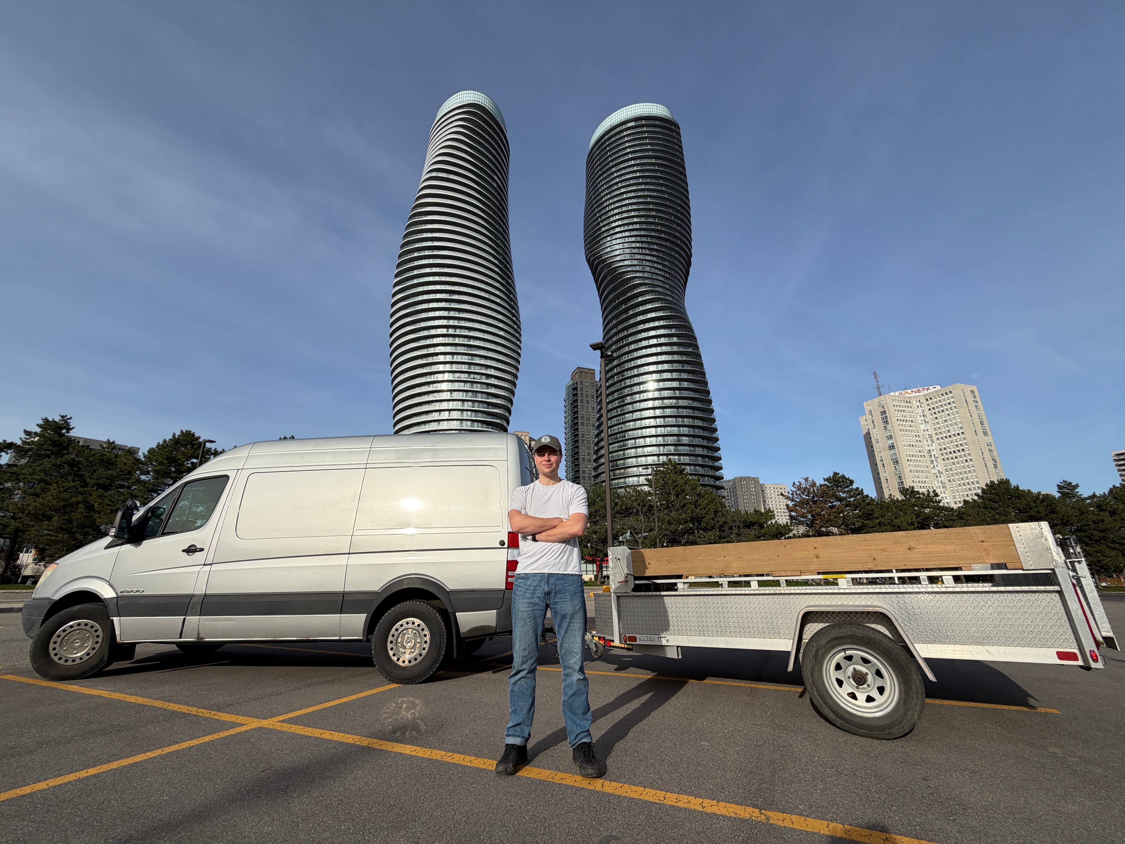 The itsgone.ca Sprinter van and utility trailer setup in Mississauga.